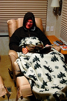 Mark snuggles in the cold evening air before our vent-free propane heater installation in our RV