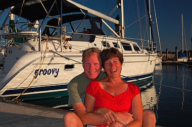 Mark & Emily Fagan with our floating home "Groovy" in Mexico.