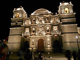The Santo Domingo Cathedral lights up the night sky in Oaxaca, Mexico