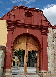 This church has two doors-within-a-door at their front gate.