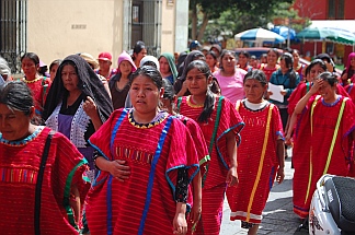 Red clad protesters in Oaxaca, Mexico