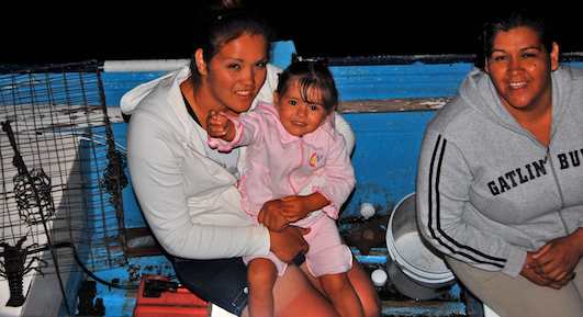Family in Boat in San Evaristo