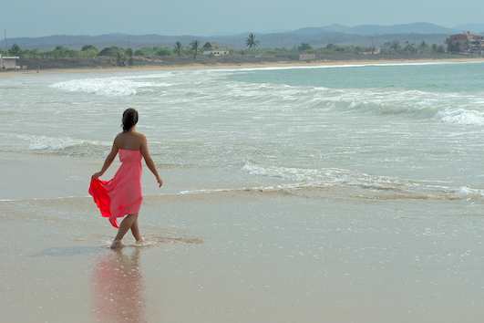 Rosie walks on the beach Tenacatita