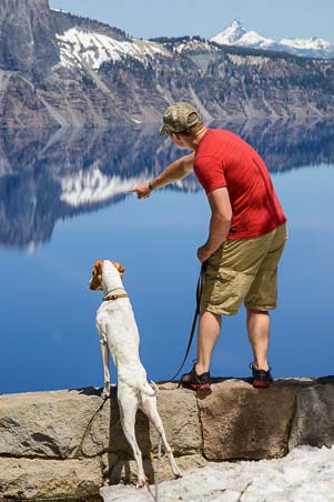 Dog and owner check out Crater Lake