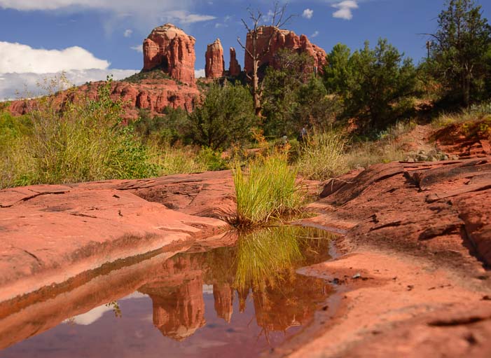 Cathedral Rock reflects in the pools of water at Red Rock Crossing in Sedona Arizona