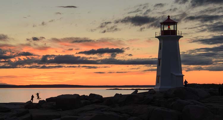 Sunset silhouettes Peggy's Cove Nova Scotia Canada