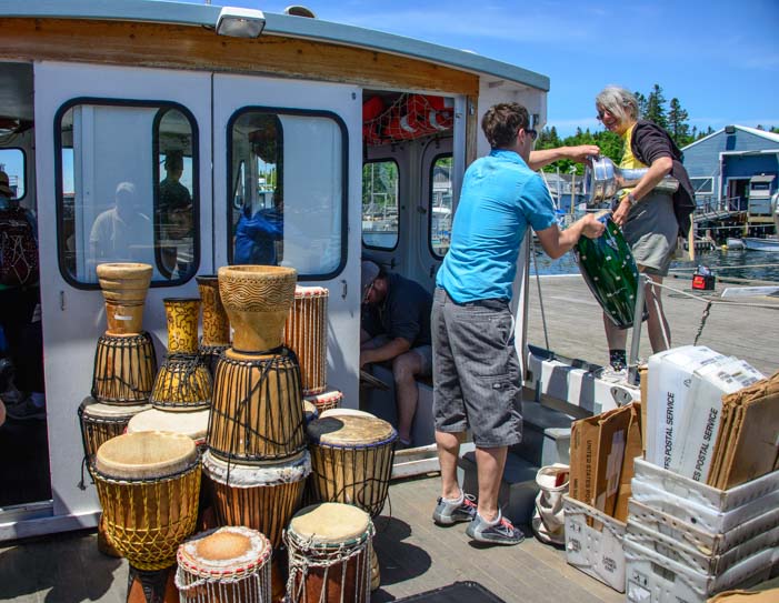 Bongo drums loaded onto Double B mail boat on Cranberry Island