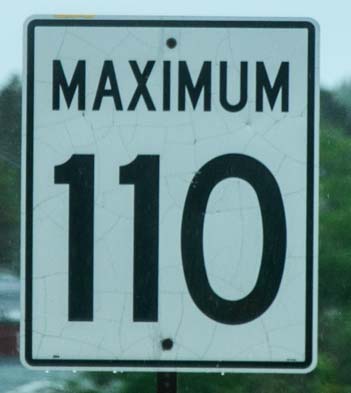 Speed limit 110 km-hour road sign