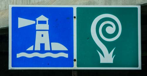 Lighthouse and snail roadsign_