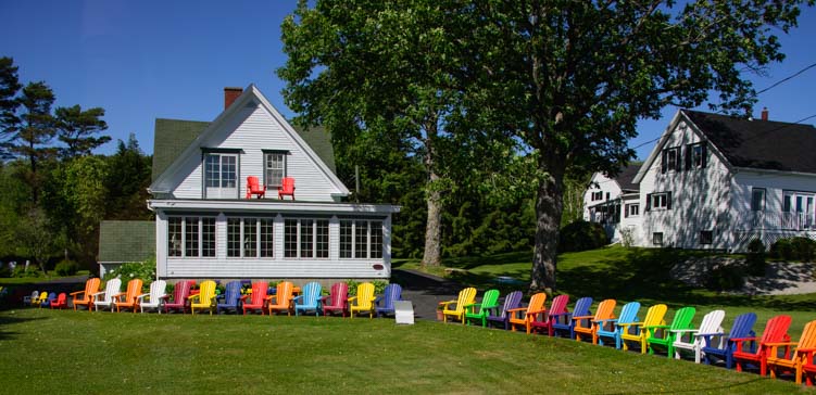 Colorful chairs LaHave River Nova Scotia Canada