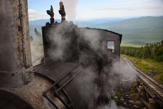 Cog Railway Train chugs up Mt Washington New Hampshire