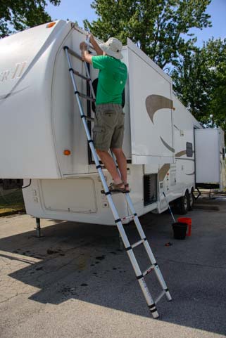 Telescoping ladder on an RV