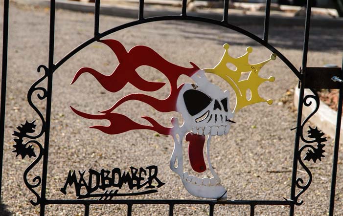 Mad bomber metal art fence Tatum New Mexico