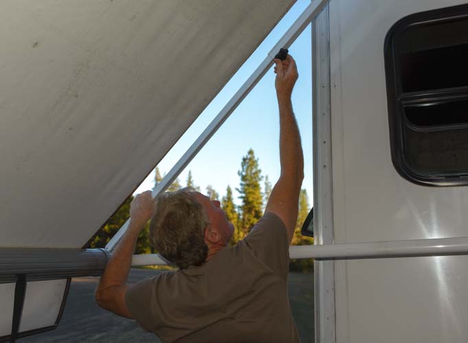 How to set up RV awning - Tighten down awning arm
