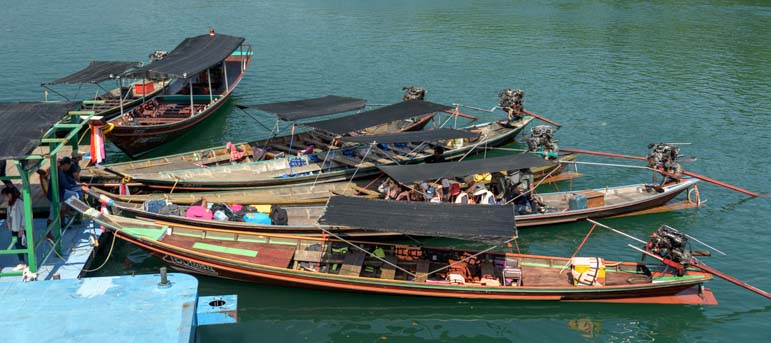 Longtail boats Cheow Lan Lake Chiewlarn Lake Khao Sok National Park Thailand