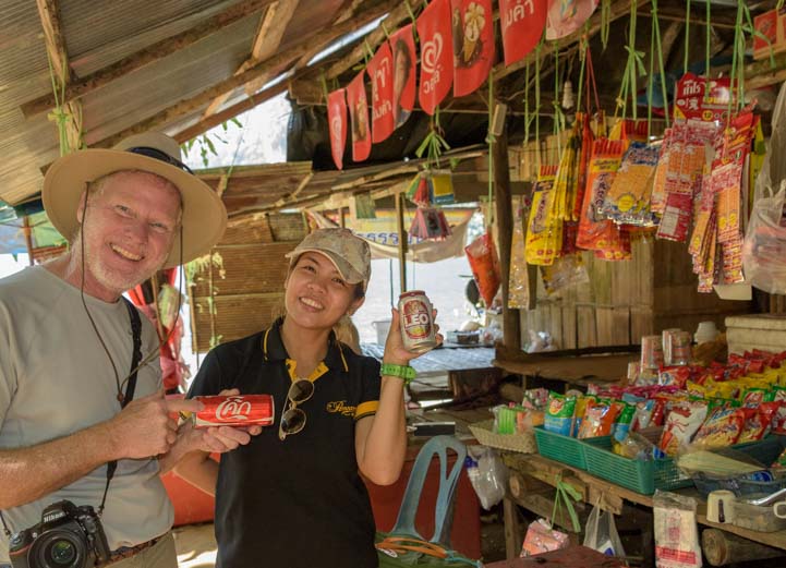 Buying a coke at an outdoor shop in Thailand