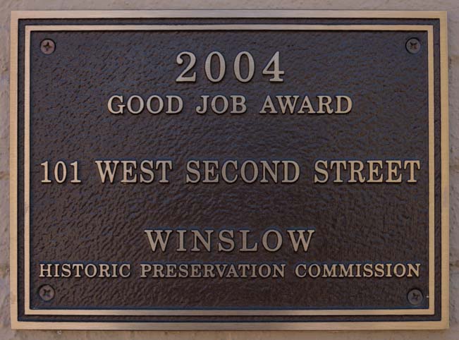 Good Job Award sign Standin' on the corner in Winslow Arizona