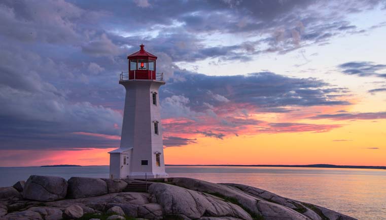 Peggys Cove Lighthouse sunset on Nova Scotia RV trip