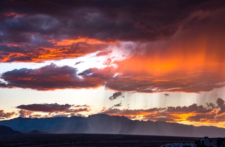 A lightning storm begins at sunset in Las Vegas