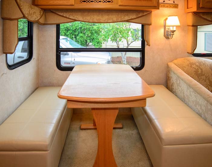 Storage benches in RV dinette add comfort and storage space-min