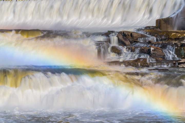 Rainbow in Ryan Dam Waterfall Great Falls Montana-min