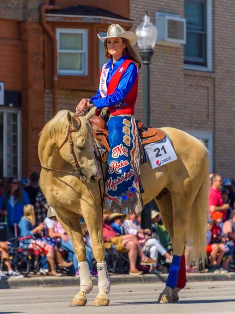 Rodeo queen 4th of July parade Cody Wyoming-min