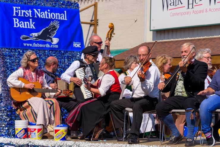 Musicians from First National Bank in the Walker Ethnic Festival parade-min