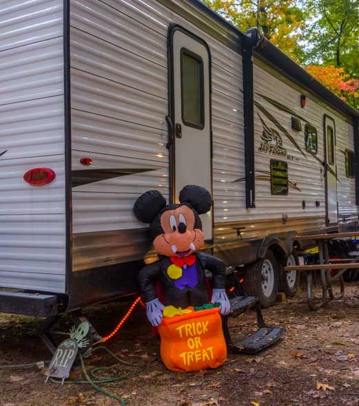 Camping Halloween travel trailer RV with pumpkin decoration-min