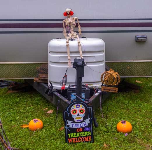 Trailer propane bottle with Halloween trick-or-treat decorations-min