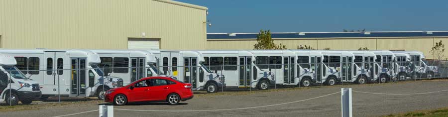 Shuttle buses lined up in Elkhart Indiana-min