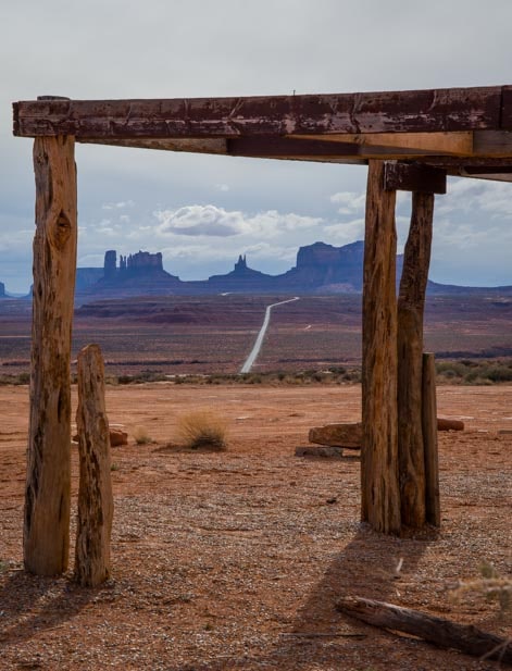 Monument Valley framed by Navajo jewelry stand-min