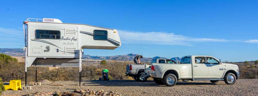 Arctic Fox truck camper moves from one truck to another