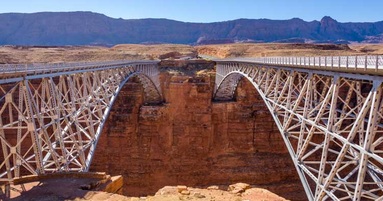 The original Navajo Bridge is now a pedestrian bridge next to the truck-friendly new one.
