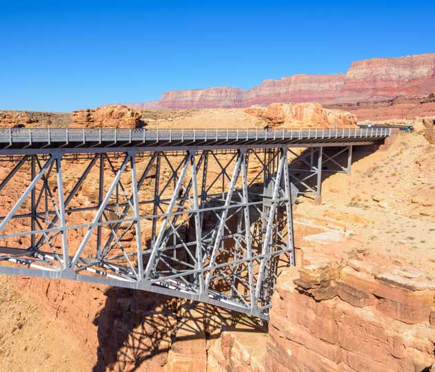 Navajo Bridge is anchored to the red rocks
