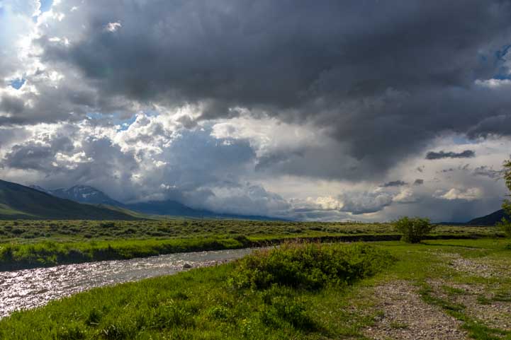 Storm clouds over river in Idaho