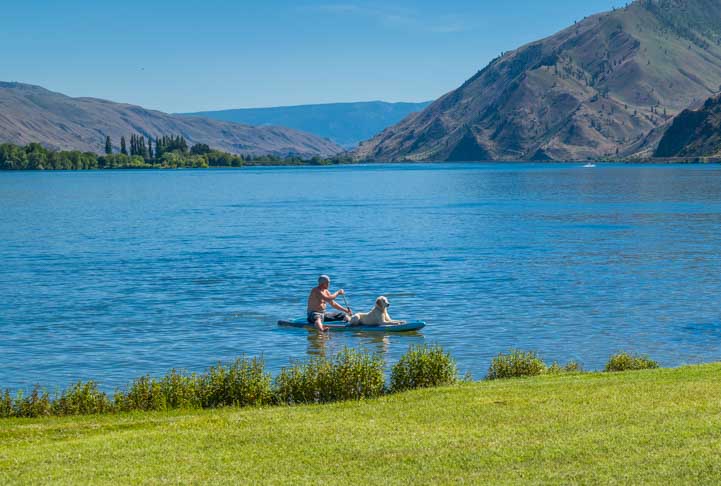 Paddleboard with a dog in Entiat City Park Washington_