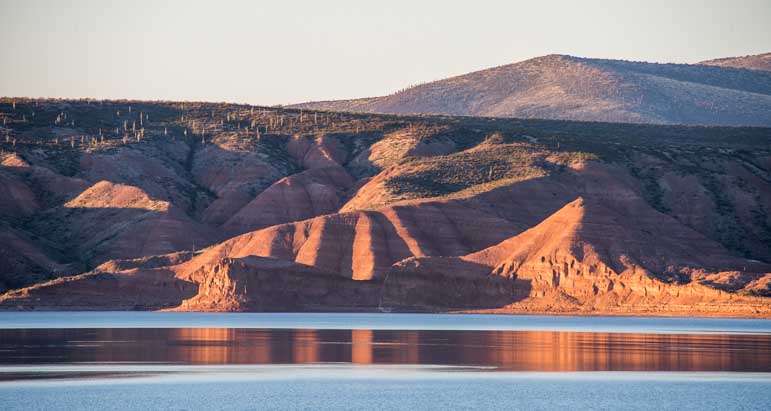 Roosevelt Lake Arizona red rocks at sunset