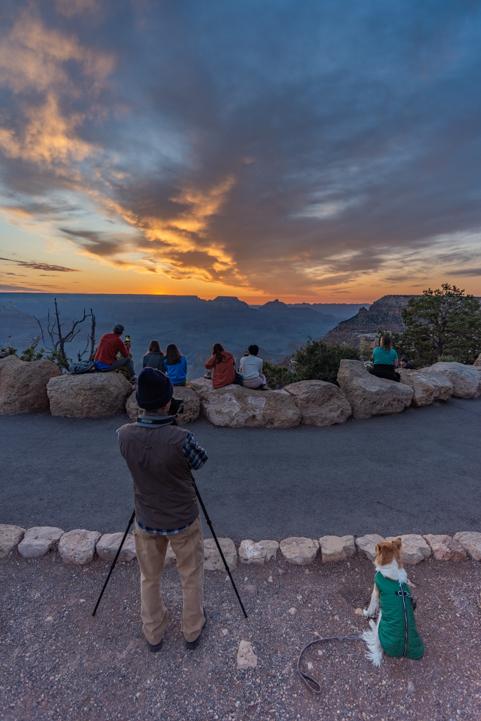 People watch and photograph sunrise at Mather Point in Grand Canyon National Park