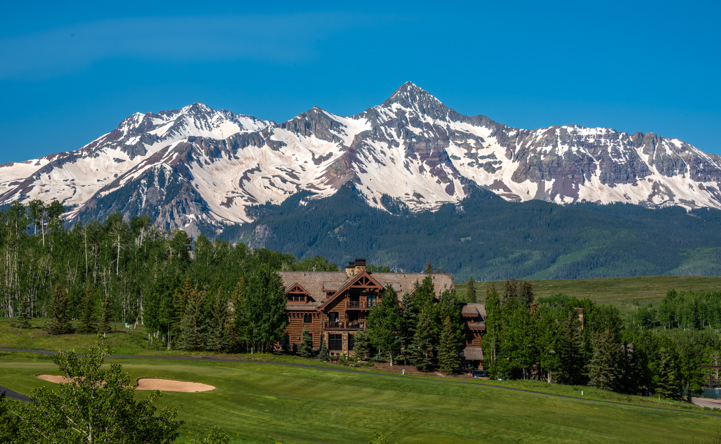 Elegant mansion estate with snow-capped mountain backdrop in Mountain Village atTelluride Colorado