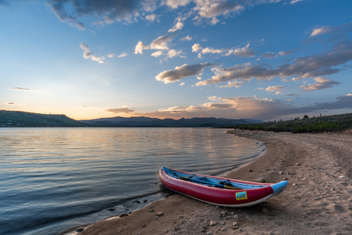Lake Granby Colorado with a kayak on the beach